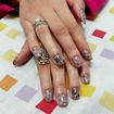 Unhas DecoradasUnhas Esmaltada + Carimbada e colação de Glitter 1 á 1. 