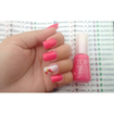 Unhas em gel com esmaltação e decoradas com botão de flor