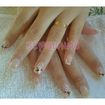 Unhas decoradas com botão de flor