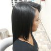 Escova e chapinha em cabelo afro