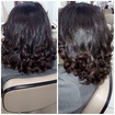 # Escova  e prancha em cabelo afro.