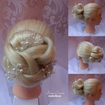 Penteado: coque alto tramado